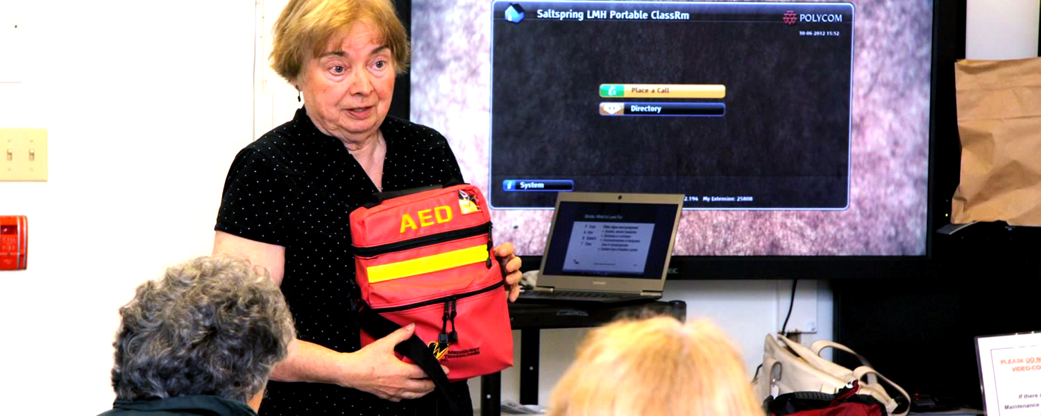 Holding AED during presentation